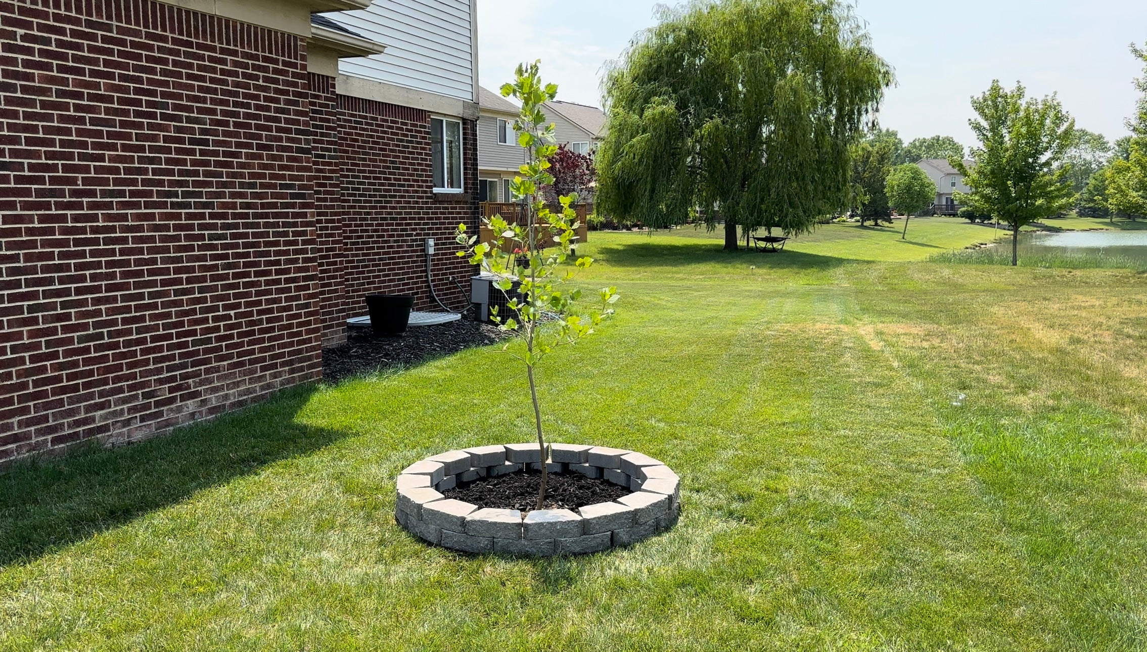 Load video: PaverTrax - Building a paver tree ring in less than 10 minutes